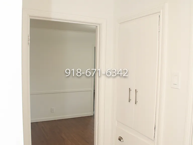 View of hallway from Primary bedroom to dining room.