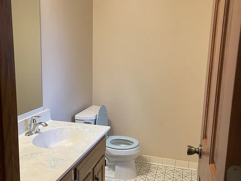 haft bath in master bedroom