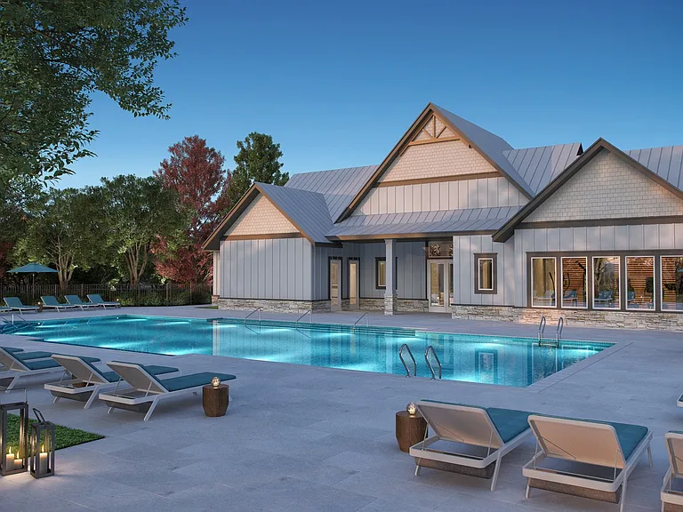 Resort-style pool with spacious sundeck and lounge seating. This image is a representation of the pool with sundeck at Amavi Brier Creek and is tentatively scheduled to open Summer 2025.