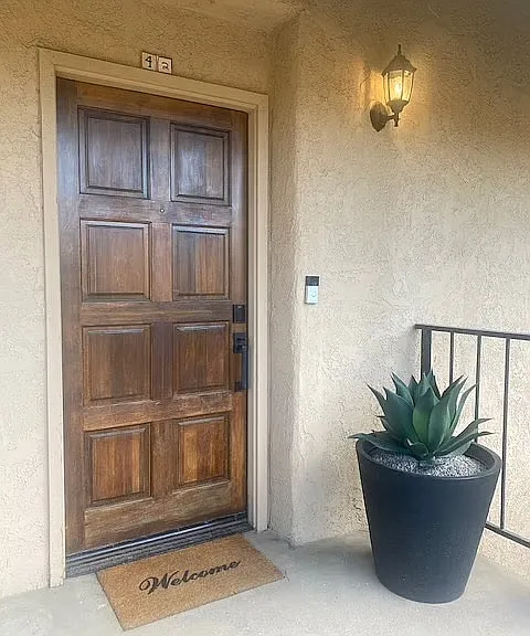 Ring doorbell and code to enter.