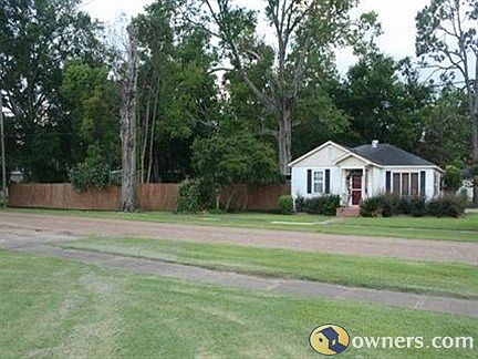 House on corner lot; large fenced-in yard