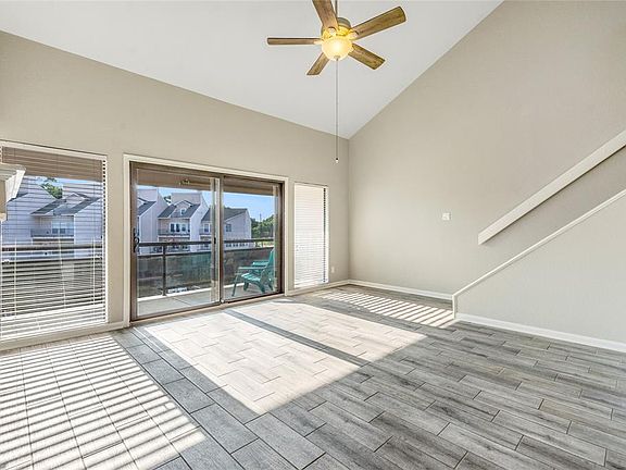 Living room with beautiful views of the marina & lake
