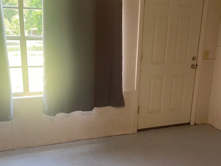 Laundry room with backyard access