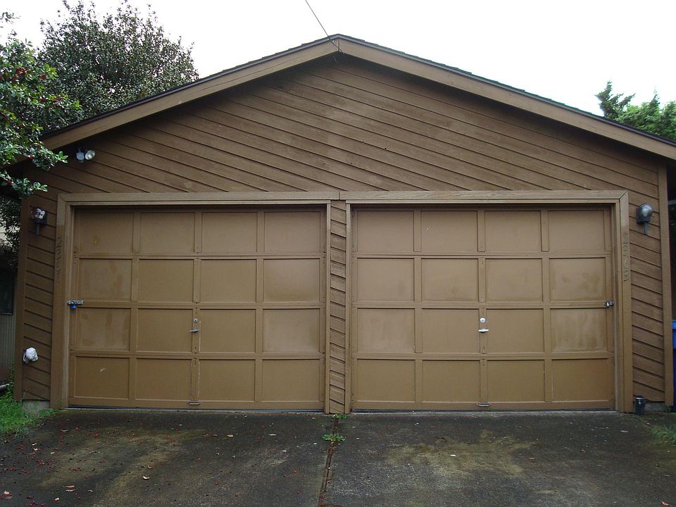 This is the view from the sidewalk/street. The left driveway and garage belongs to this unit.