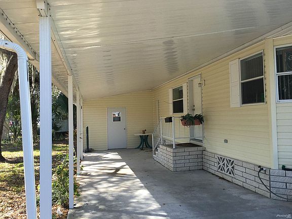 View of Storage Room and carport