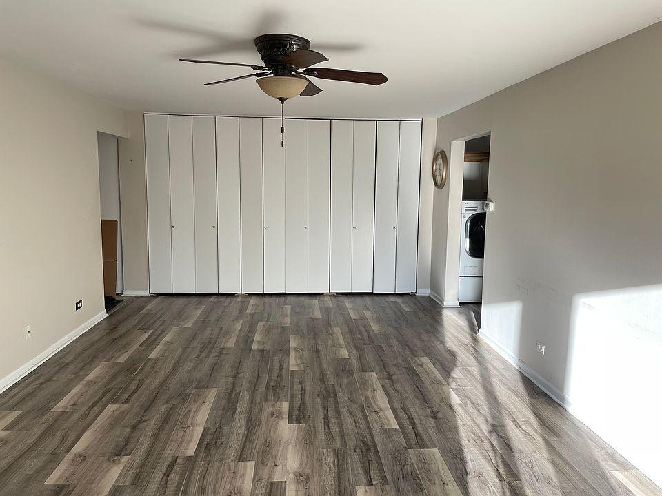 Living room with ample amount of storage in closets