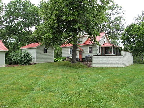 View of house from back of large yard