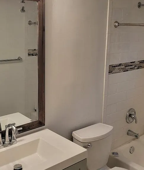 Vanity plus mirror & light from doorway.