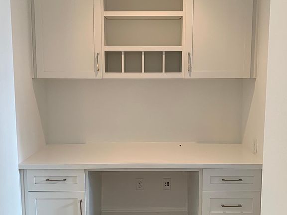 Desk area next to kitchen and family room