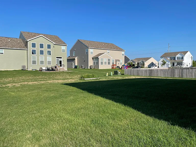 View from side of house looking at the backyard.