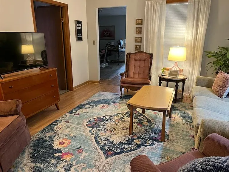 Family room facing down stairs bedroom