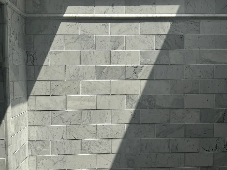 Inside guest room shower with skylight.