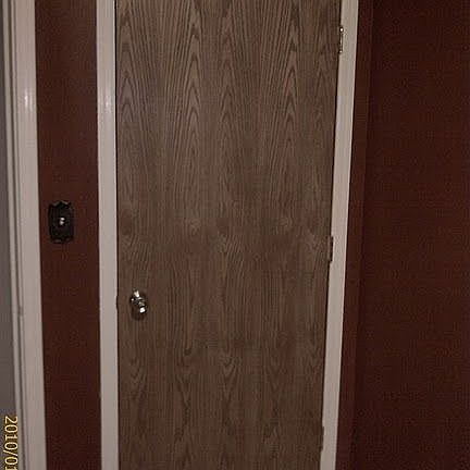 Replaced 1st story bedroom door and trim in 2009