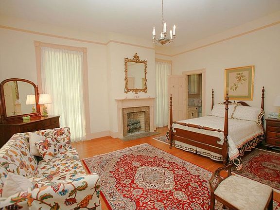 Expansive master bedroom with fireplace