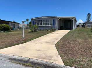 1161 Waterway Dr, Barefoot Bay, FL 32976