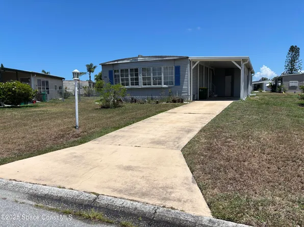 1161 Waterway Dr, Barefoot Bay, FL 32976