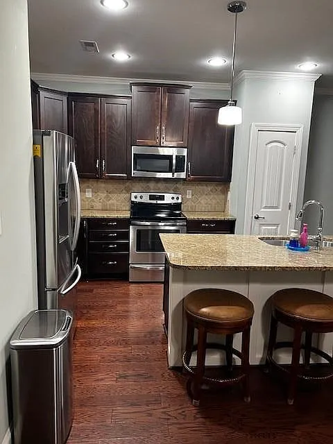 Kitchen with SS appliances and granite countertops - 734 Carolina Ave