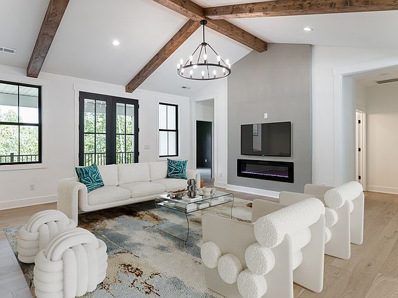 Living room with access to covered porch