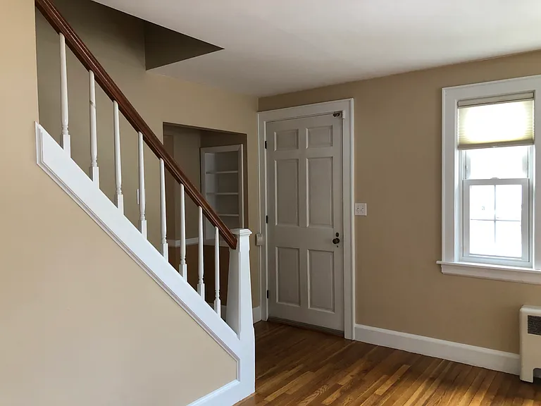 Living room stairs and front door