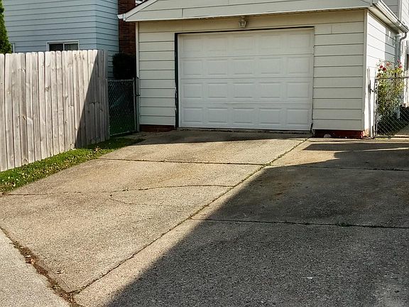 Attached garage with entrance to kitchen. Fenced partial privacy area.