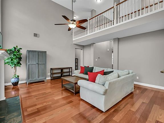 Filled with natural light this living room invites you to relax and enjoy.