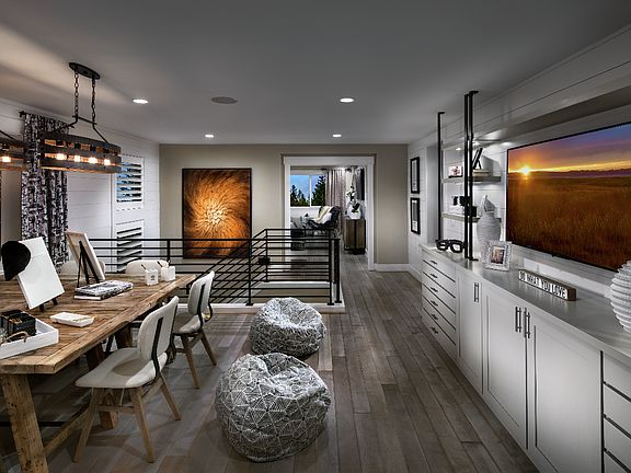 The upstairs loft provides a secondary gathering area