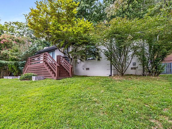 fully fenced rear yard and large front deck