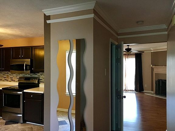 Upon entry, you have the kitchen on your left, stairs on you