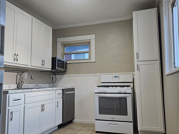 Kitchen (new cabinets + countertop)