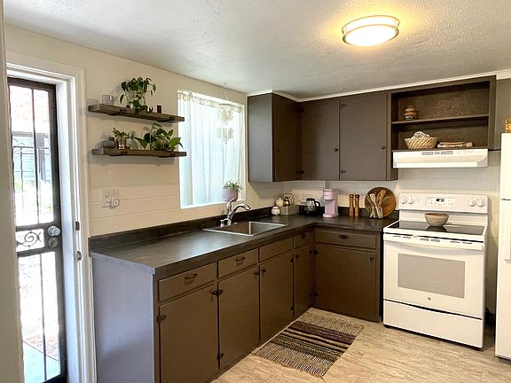 Kitchen with side entrance.