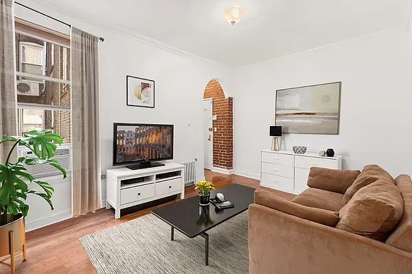 1st image of 261 W 22nd St APT 6