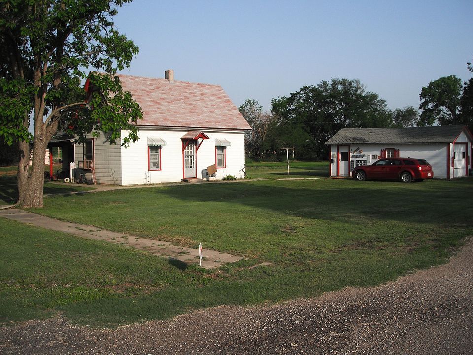 The house  nd garage on the two lots