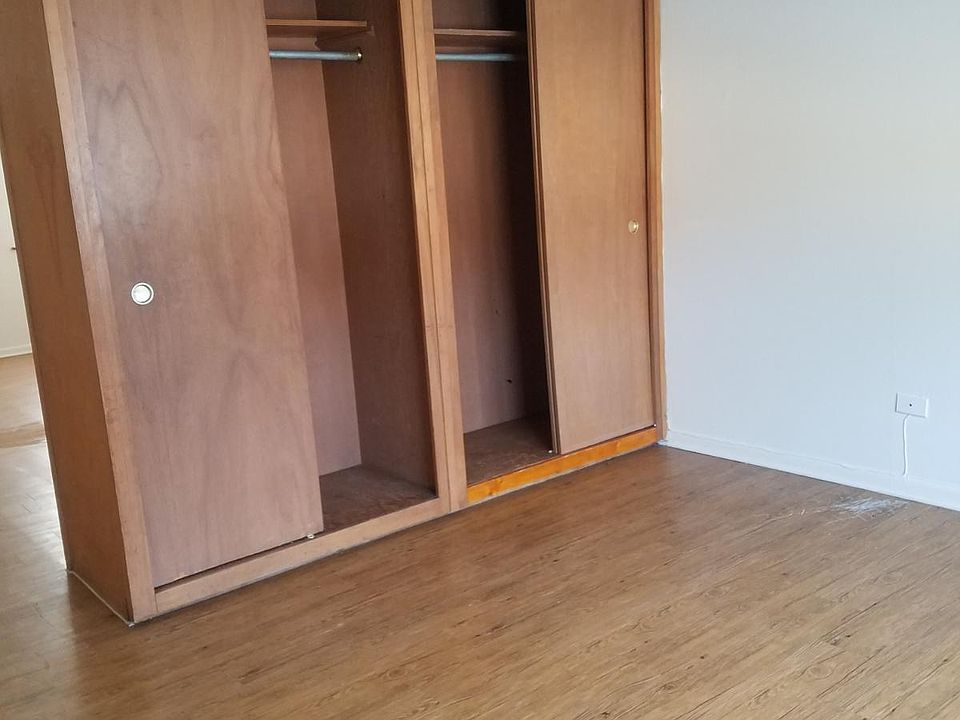 Large closet also has bars for hanging items.