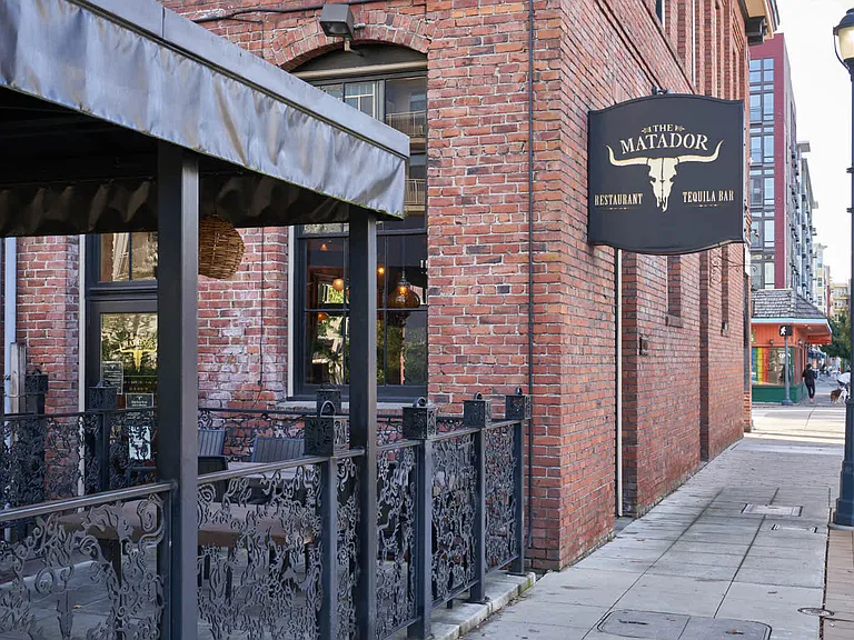 Steps away from bars and restaurants.