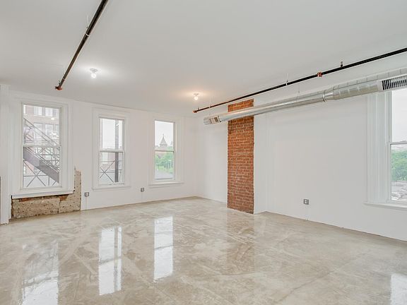 Huge living room, great for guests or family members who visit. Can comfortably hold 15+ people for a dinner party or friends get-to-gether. You'll also notice, large windows and tons of sunlight in the apartment. We have 2 units left, the layouts of the