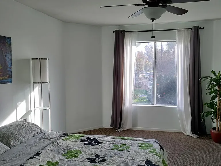 Upstairs front bedroom with attached full bathroom