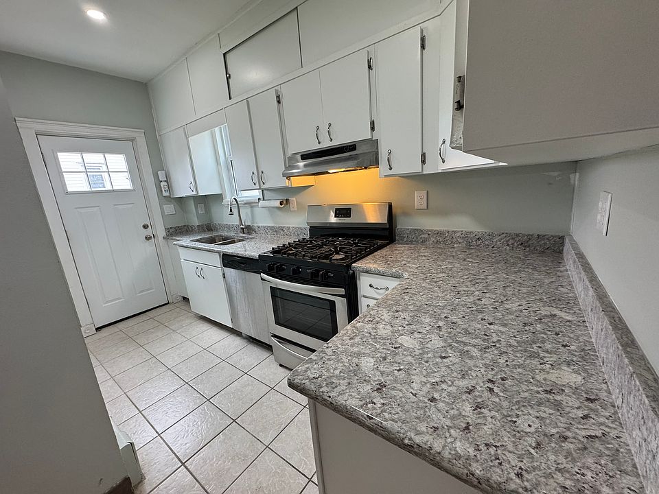 kitchen first floor with door to rear yard