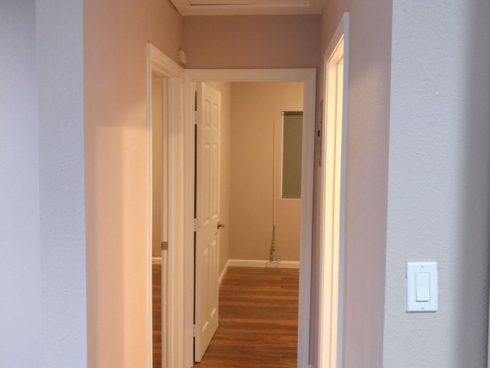 Hallway to bedrooms and bathroom