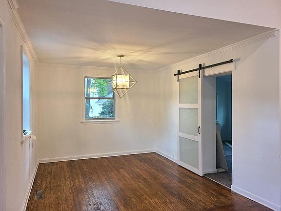 Breakfast area with entrance into sunroom