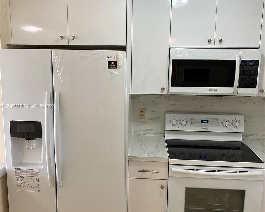 1st image of 6565 W 26th Dr APT 103-34