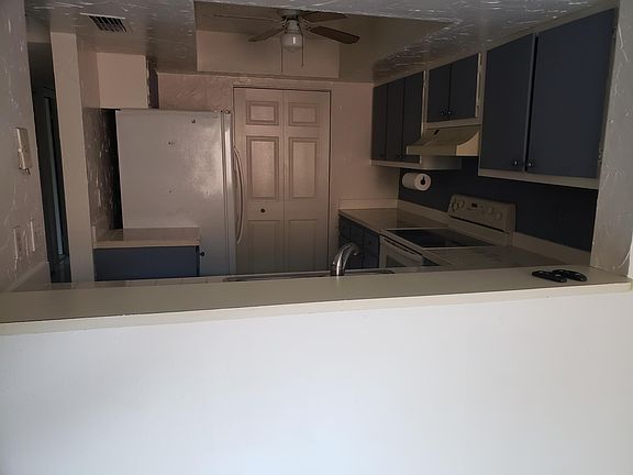 Kitchen counter pass through from dining room.