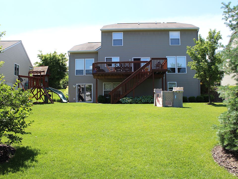 Large backyard with playset