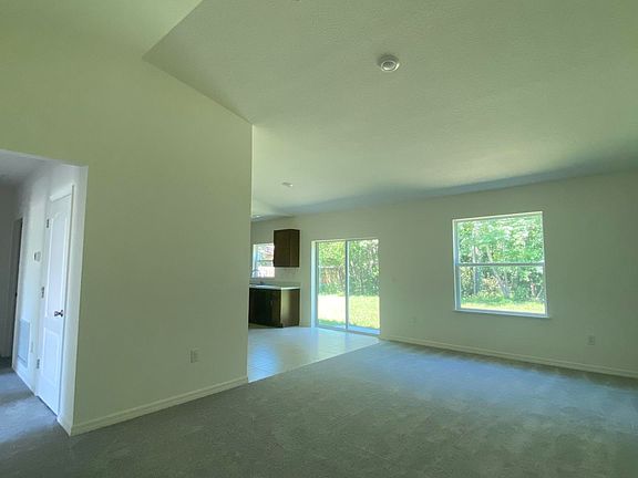 View from entry of great room hall kitchen