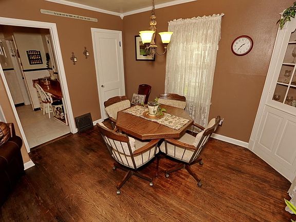 Dining room features corner hutch and additional closet space
