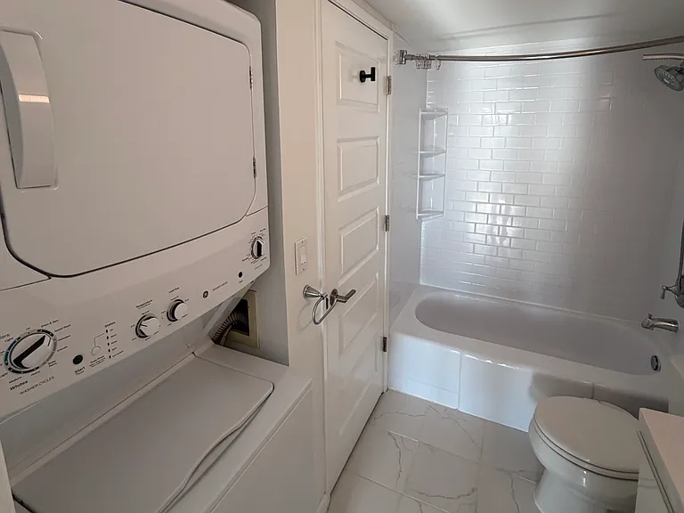 Primary bedroom bath + W/D