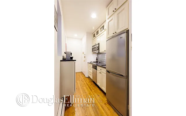 Sold by Douglas Elliman | media 17