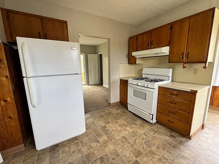 view of kitchen with door leading to the dining room