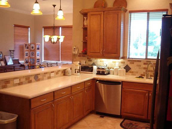 Maple Cabinets and Corian Tops