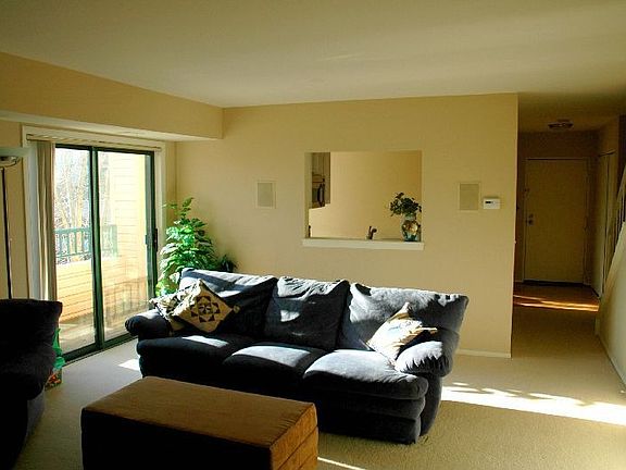 Large living room with porch access