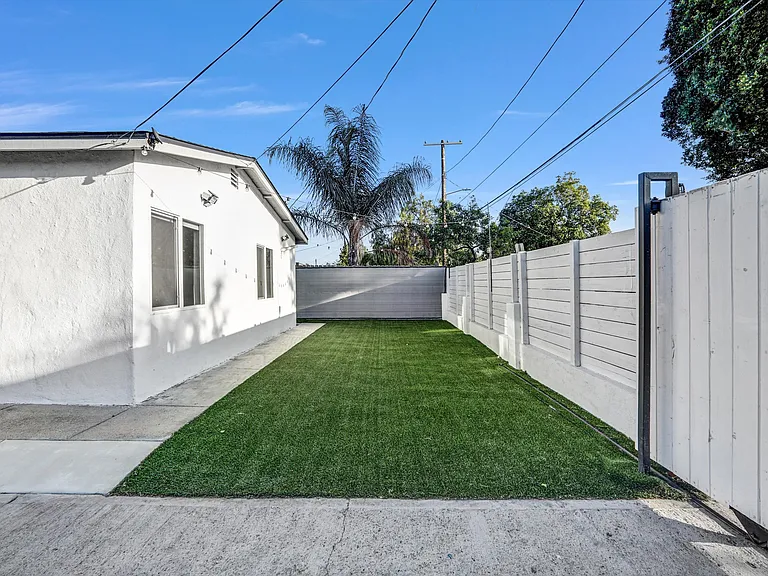 front yard with low maintain artificial grass